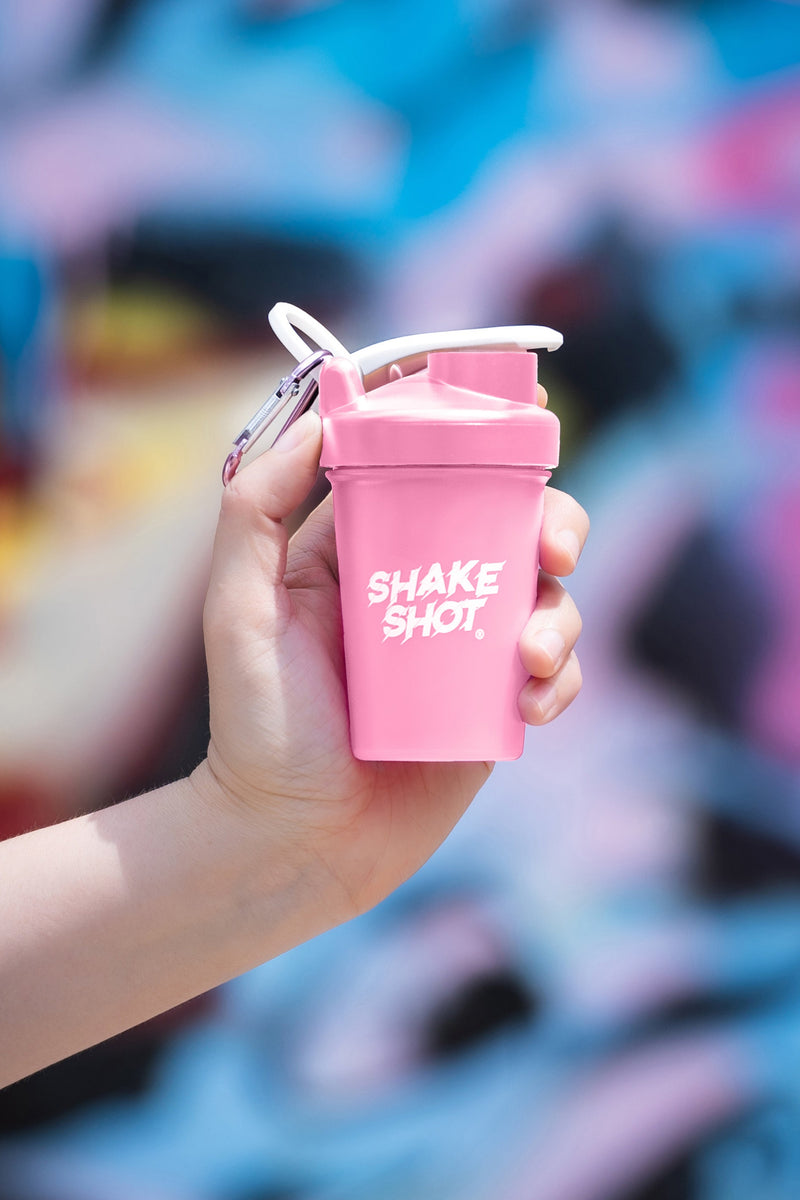 Shake Shot 4 oz pink mini shaker bottle with carabiner clip and stainless shaker ball