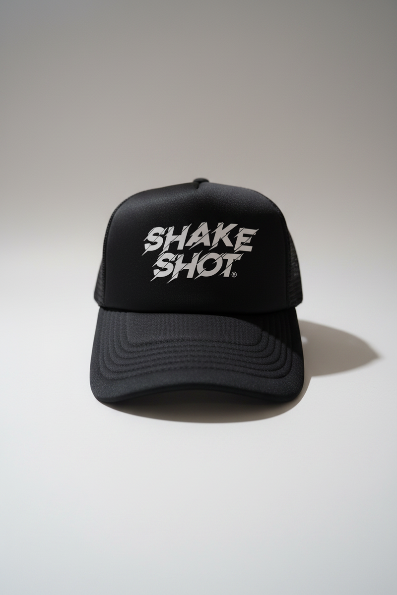 Black cap with 'SHAKE SHOT' text on a white background